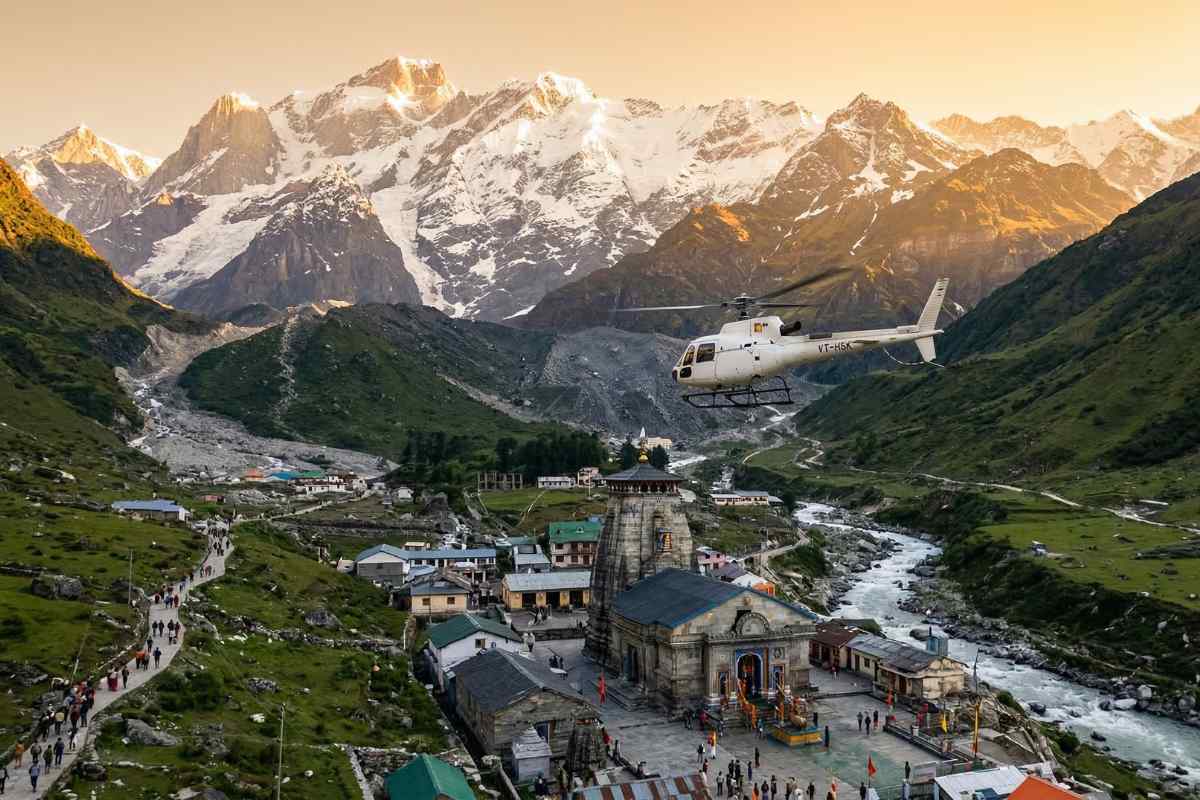 Helicopter flying over Kedarnath Temple in Himalayas – Helicopter Booking Guide for Temple Yatra 2026