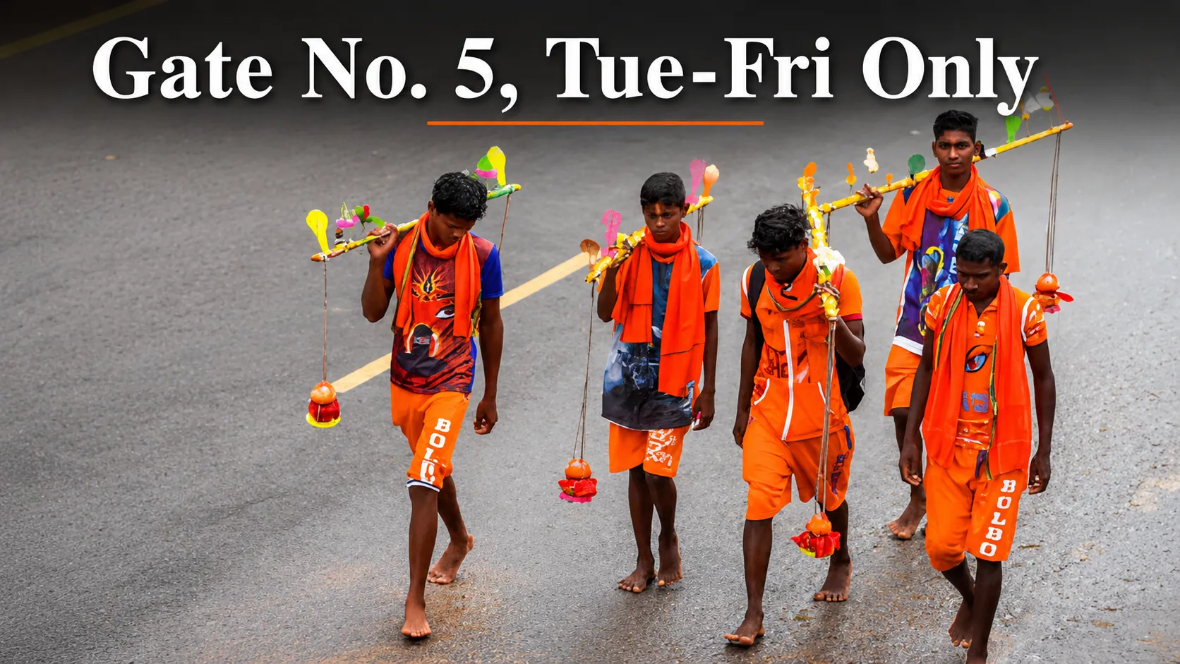Kawad Yatris carrying holy water toward Mahakaleshwar Temple Gate No 5.